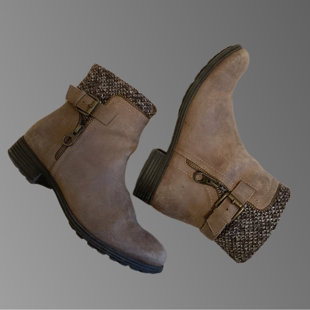 Light brown, zip-up winter boots.